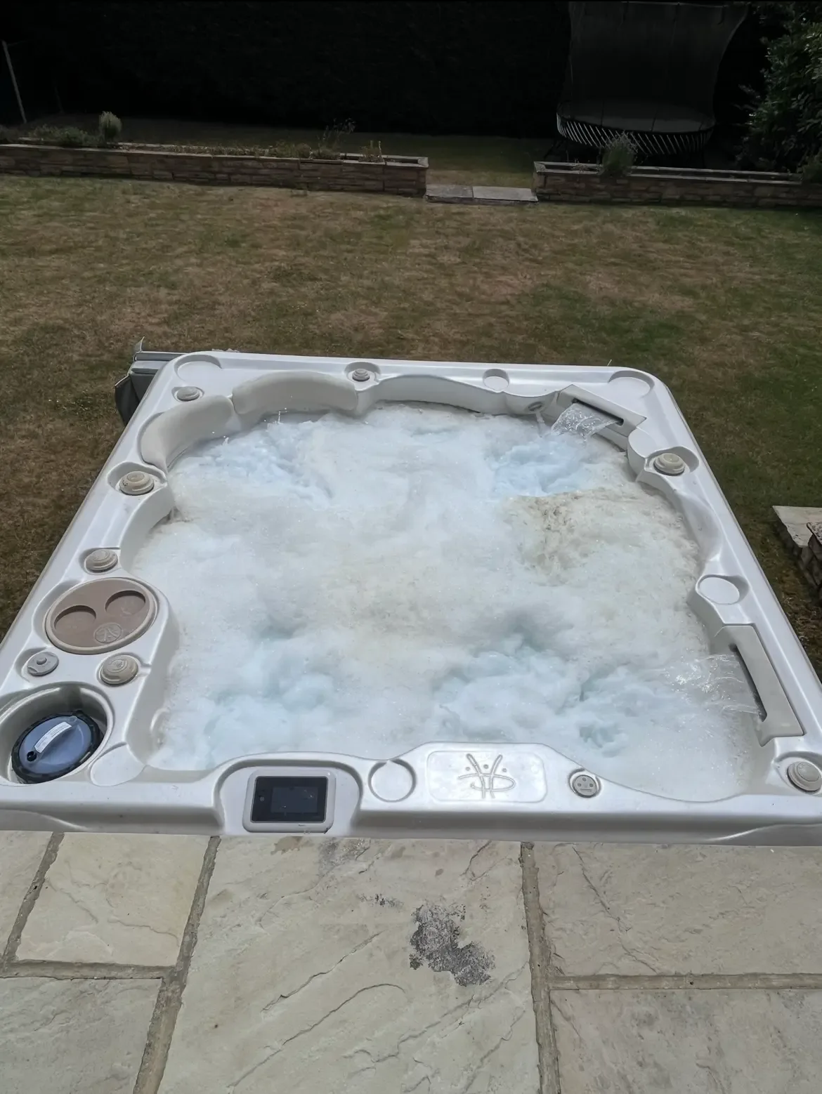 Bubbling hot tub viewed from above