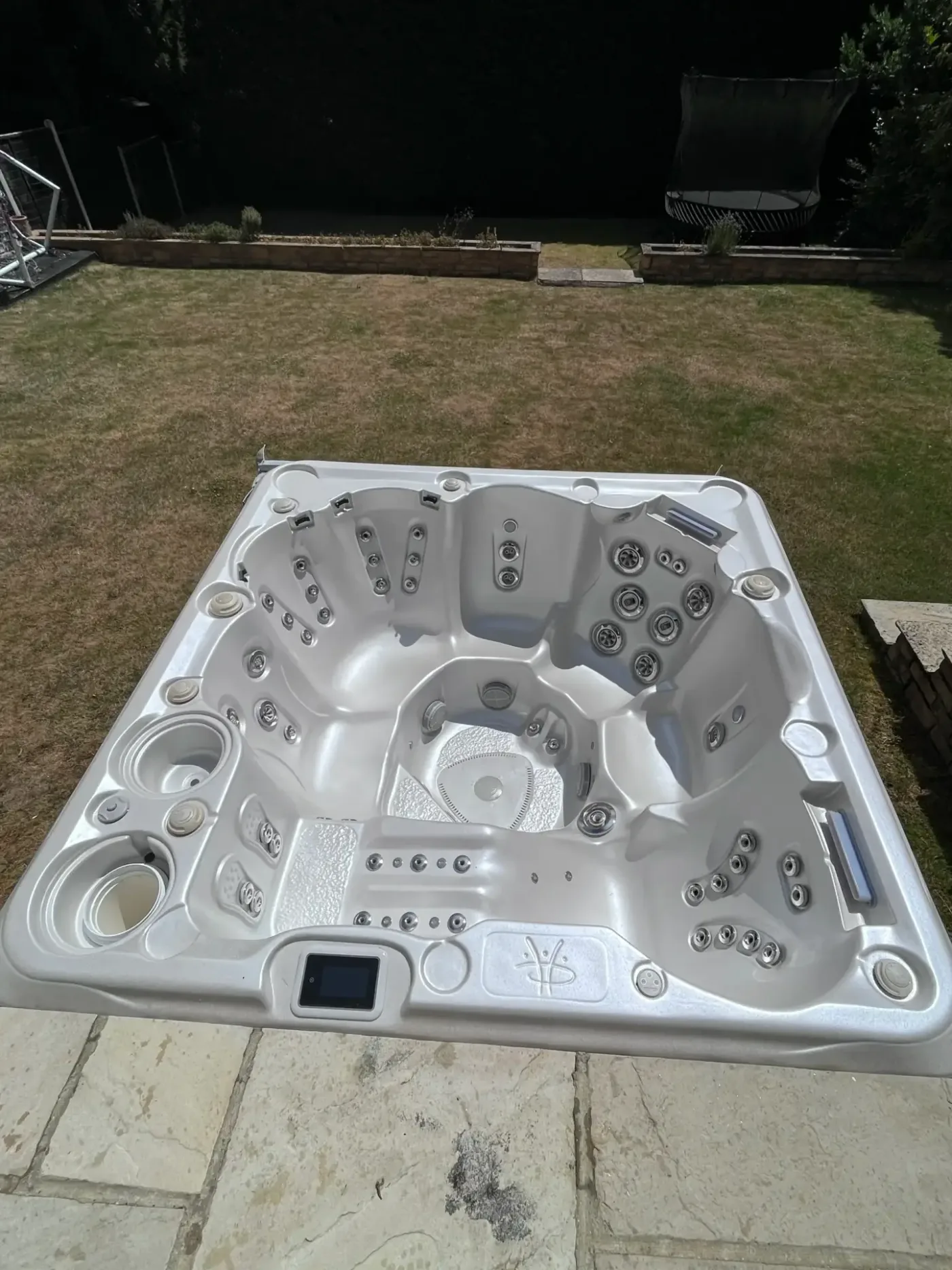 Spa installation in a garden setting